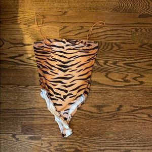Really cute tiger/cheetah tigermist bodysuit!